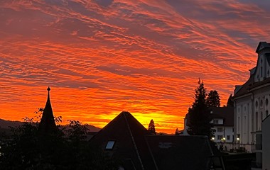 Sonnenuntergang vom 24. September, rechts ist die Mauritiuskirche Ruswil zu erkennen. | Hans Felder, Ruswil 
